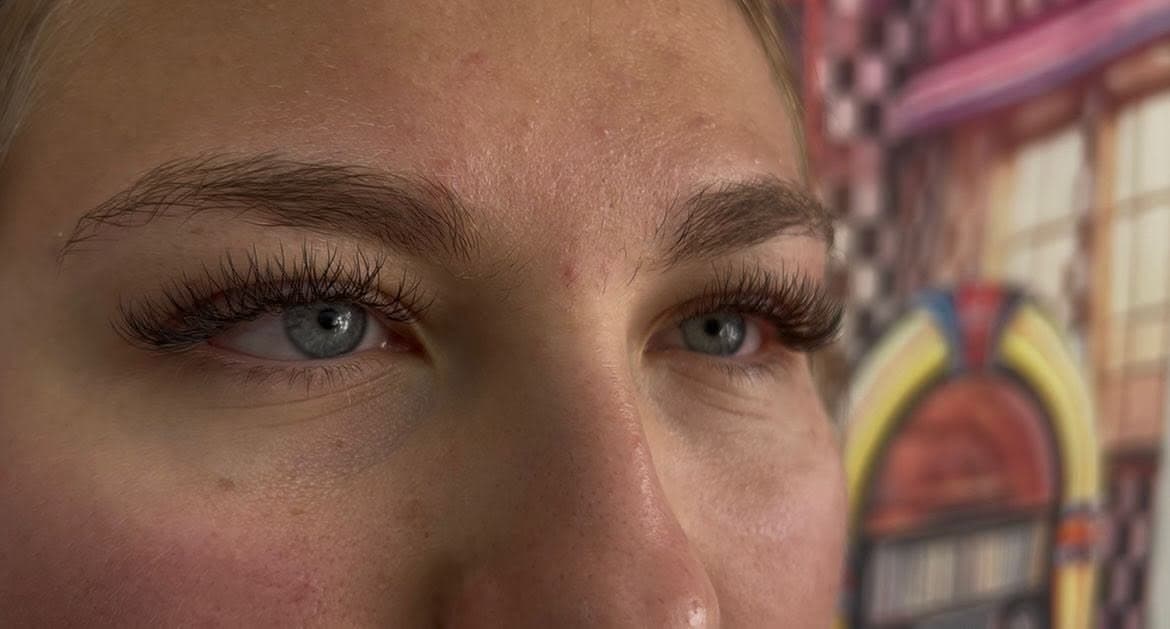 A finished lash set framing both eyes